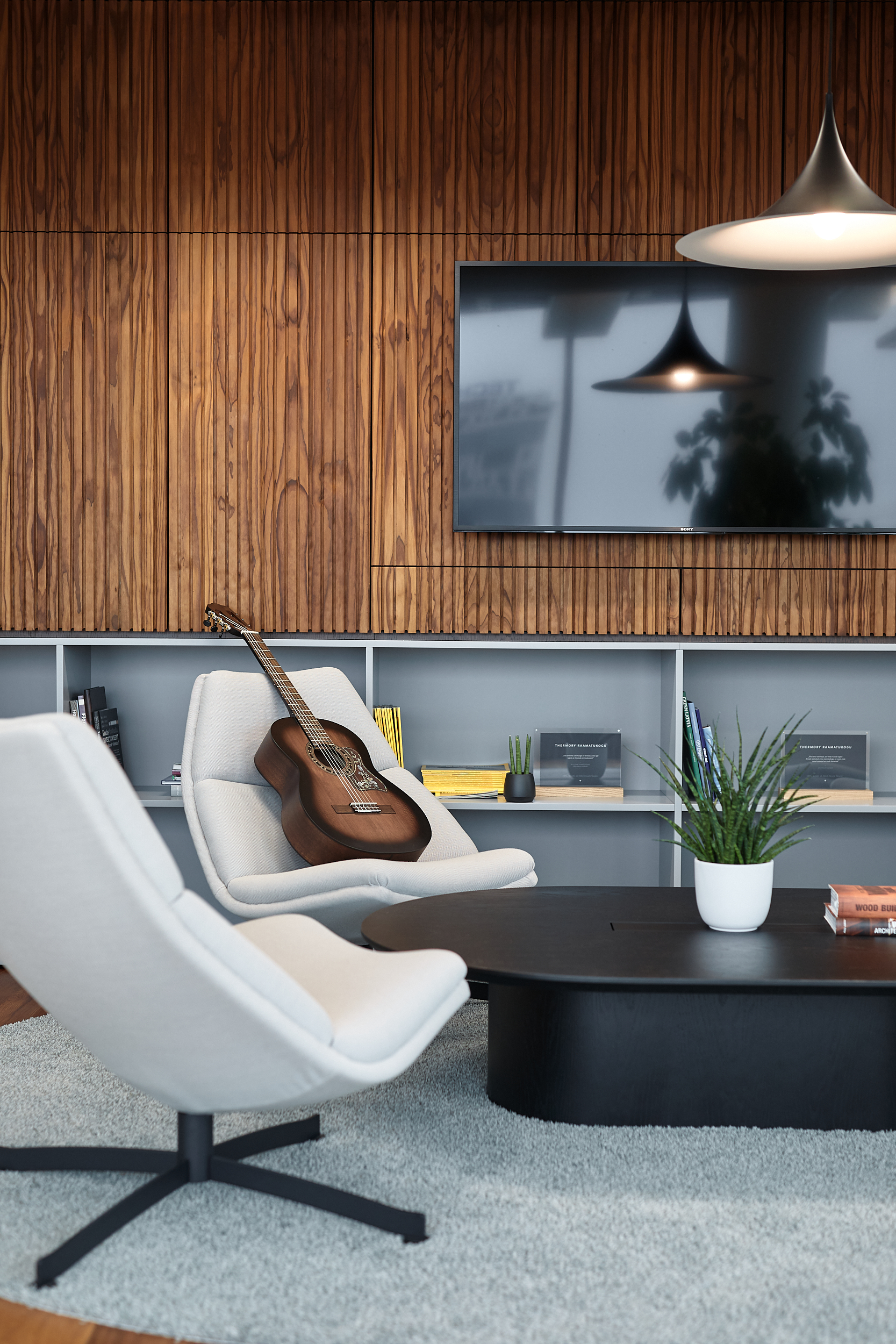 Lounge area with a guitar in Thermory office in Tallinn